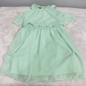 This is a teal Easter dress with lace